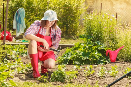 Risk-aware garden maintenance team checking site conditions