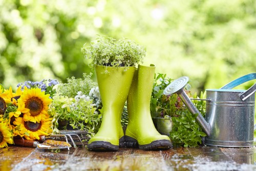 Experienced gardeners working on a residential garden in Arnos Grove